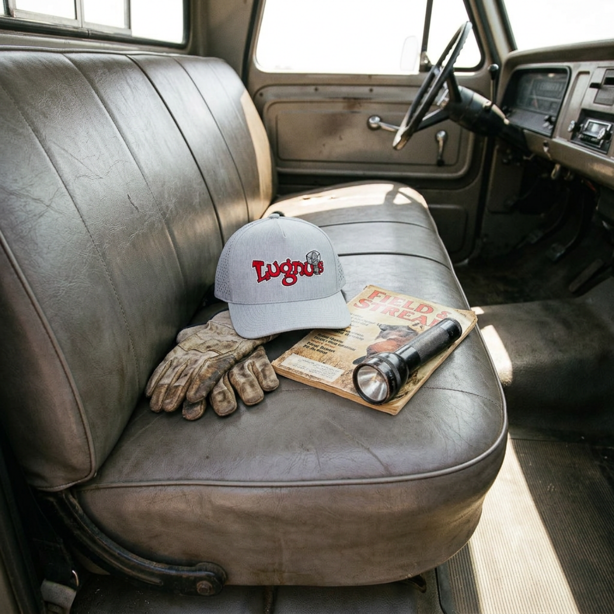 Lugnuts Zapped Blackhawk Cap resting on an old truck seat