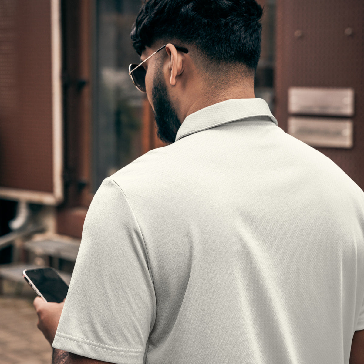 Adidas space-dyed polo shirt in Grey One Heather, back view