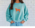 Embroidered Highland Cow sweatshirt styled on model