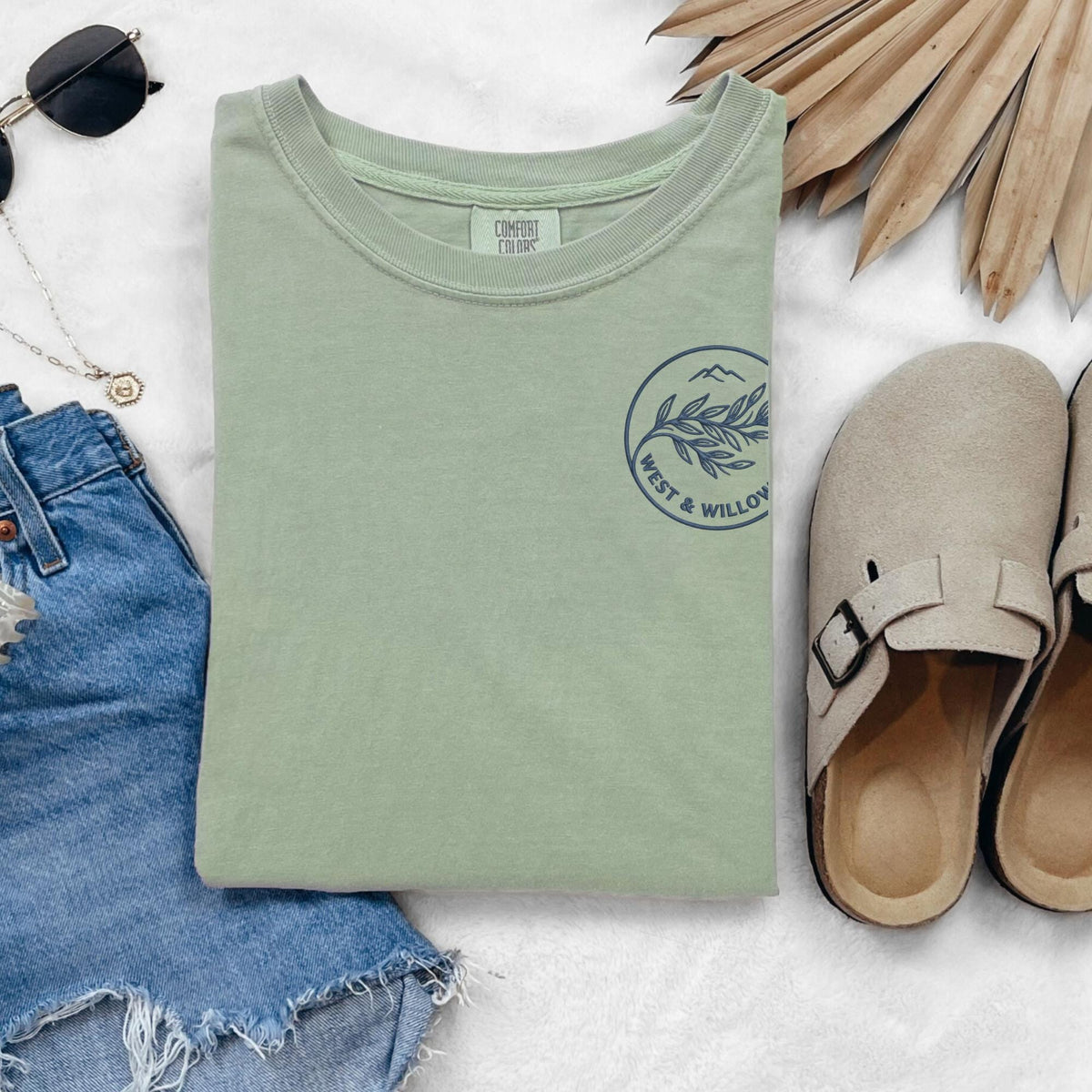 Embroidered logo tee shown in Bay colorway