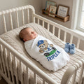 Custom baby blanket styled in nursery