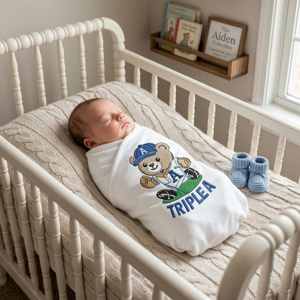 Custom baby blanket styled in nursery