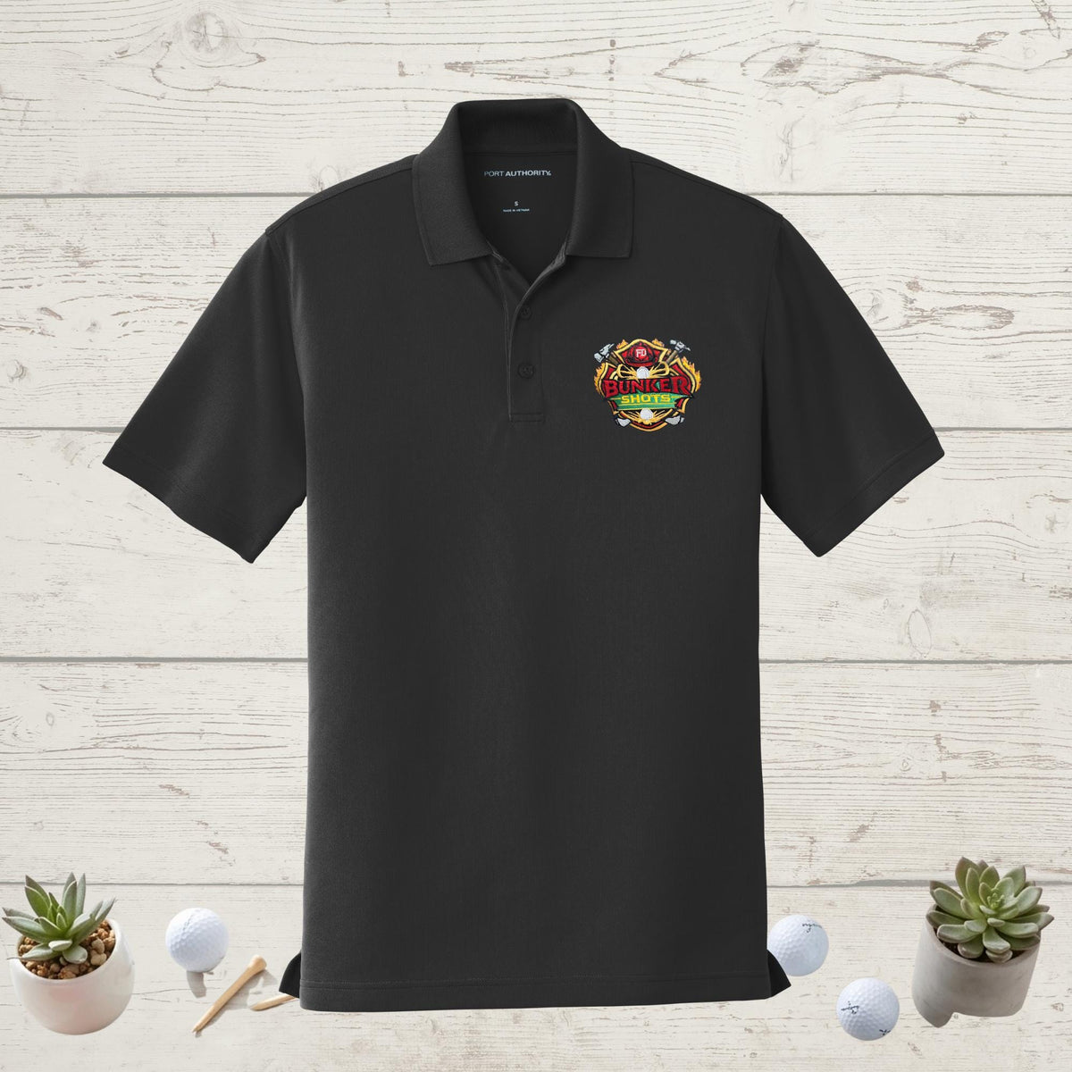 Embroidered logo close-up on polo shirt chest
