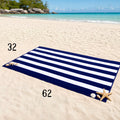 Personalized beach towel draped over beach chair