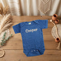Personalized baby bodysuit embroidered name close-up