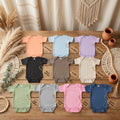 Custom embroidered baby bodysuit with name personalization